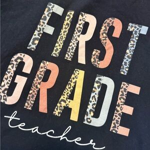 Bella Canvas Black First Grade Teacher T-Shirt